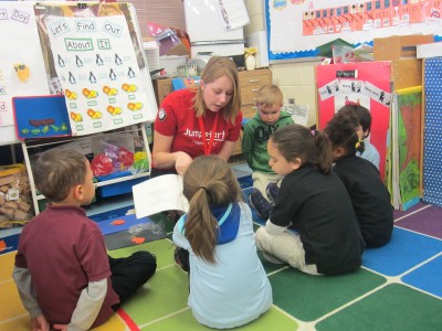 Emily Baseler reads to pre-school children. 