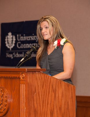 Kimberly Ruiz accepts the 2012 Outstanding Educator Award at the Neag Alumni Society Awards Dinner. (Photo: Tom Hurlburt/Neag School)