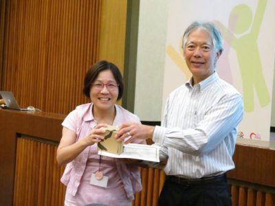 Li-Yu Hung, professor in the Department of Special Education at National Taiwan Normal University in Taipei City and host of the Conference, greets George Sugai. 