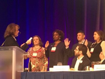 Bianca Montrosse-Moorhead is sworn in as a board member-at-large during the AEA annual conference.