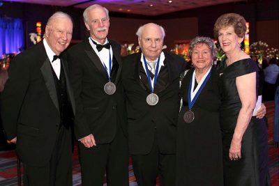 From left: Ray Neag; Dr. Dick Salmon on behalf of Cigna; Richard Lublin on behalf of him and his wife, Jane Lublin; Irene Engel; and Carole Neag at the 2014 White Coat Gala. Engel, the Lublins, and Cigna were the recipients of the Carole and Ray Neag Medal of Honor in April 2014. (Michael Fiedler for UConn Health)