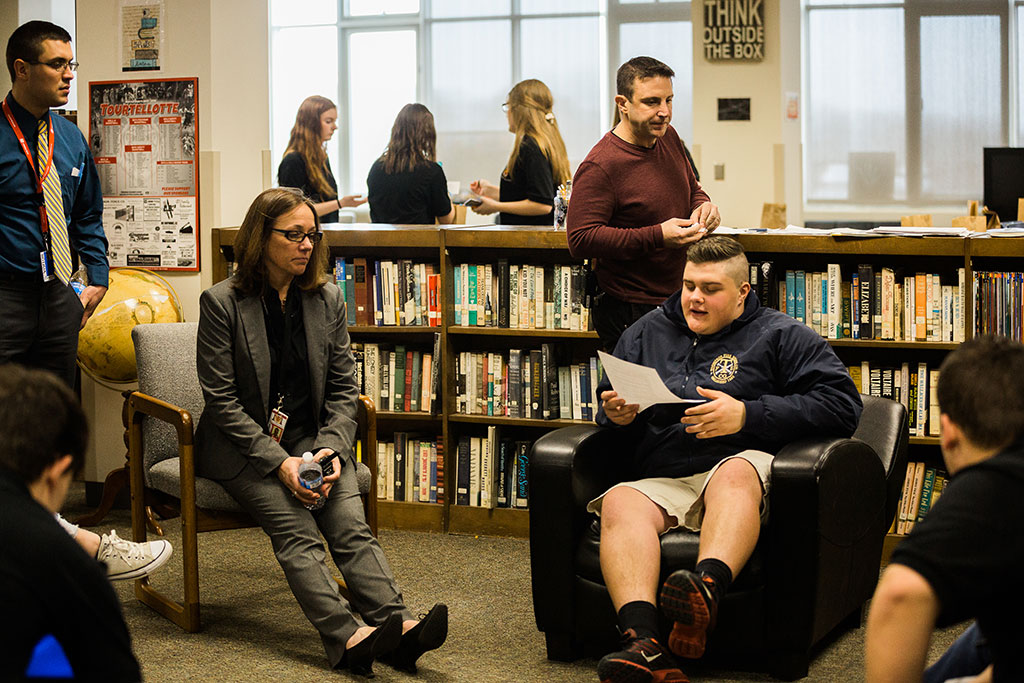 11:00 a.m. — Baker and student leader Matt Grauer discuss findings from a student leadership survey during the weekly leadership meeting in the school’s library. (Photo credit: Cat Boyce/Neag School)