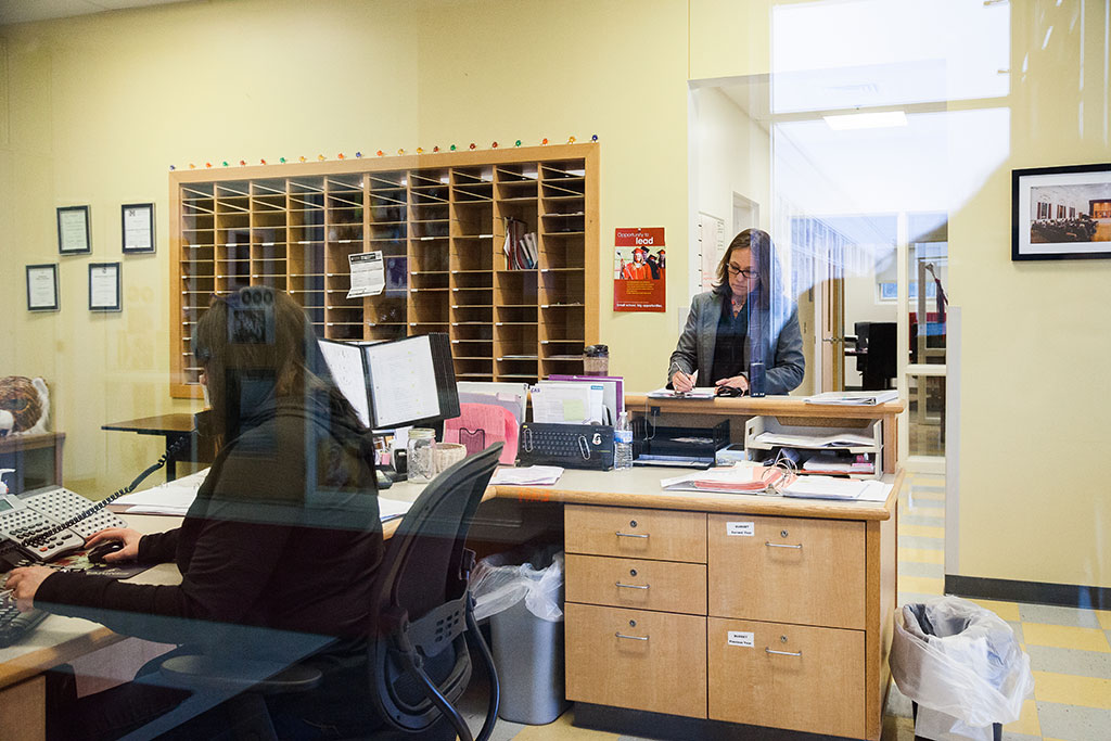 1:00 p.m. — Baker checks in at the office and confirms her afternoon schedule. (Photo credit: Cat Boyce/Neag School)