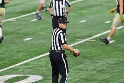 Justin Paluch ’12 (BUS, ED) officiated the Michigan High School Athletic Association Division 6 State Football Final this season. He also officiates DII college football and DI, DII, and DIII women’s basketball. (Photo courtesy of Justin Paluch)