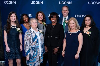 From left, Victoria M. Schilling, Deidra Fogerty, Rachel McAnellen, Maureen Ruby, Dean Gladis Kersaint, Craig Cooke, Carla S. Klein, and D. Betsy McCoach at the 2019 Neag School Alumni Awards Celebration in Storrs this month. (Roger Castonguay/Neag School)