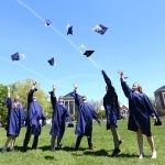 Neag School Class of 2019 grads celebrate outside of the Student Union this May.