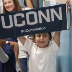 First-grader holds sign at 2019 Kennelly UConn Day.