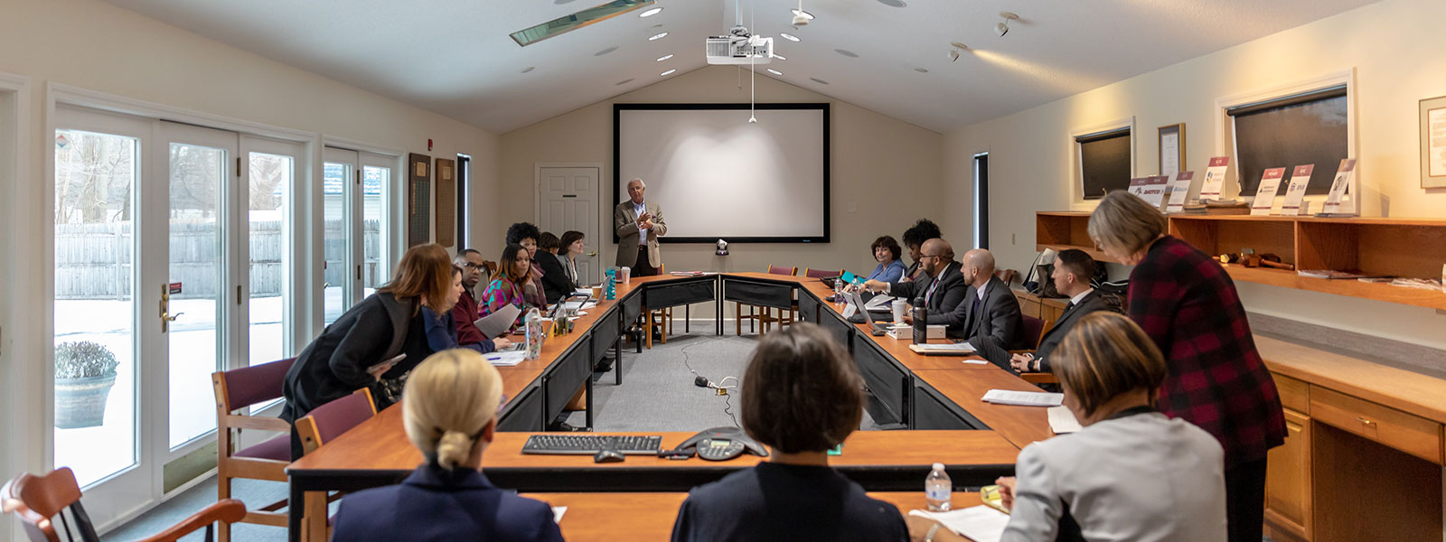 Robert Villanova of the Department of Educational Leadership leads a CAPSS Meeting in 2019.