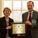 Thomas Van Hoof, pictured on the right, receives the Center for Excellence in Teaching and Learning (CETL) award from Aynsley Diamond, director of faculty outreach and engagement at CETL.