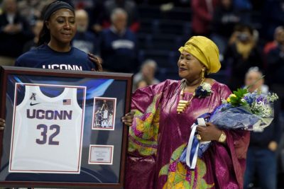 Batouly Camara and her mother at a UConn women's basketball event.