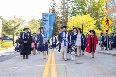 Neag School procession down Glenbrook Road. (Sydney Herdle/UConn)