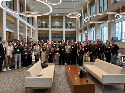 A group of people in an atrium.
